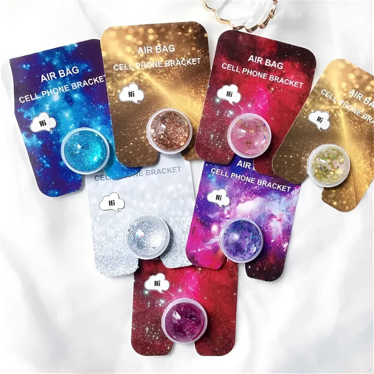 Quicksand phone holder in seven colours with liquid glitter effect, universal stand for desk or bedside use.