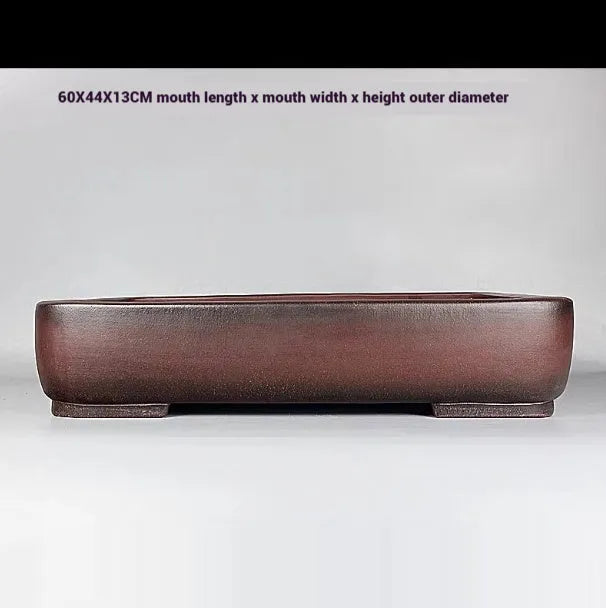 Handmade antique rectangular purple clay flower pot for tabletop or floor use.