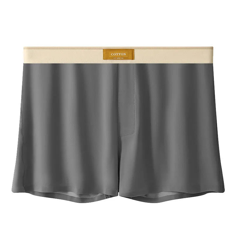 Men's solid colour loose ice silk underwear in beige, black, and grey shades laid flat