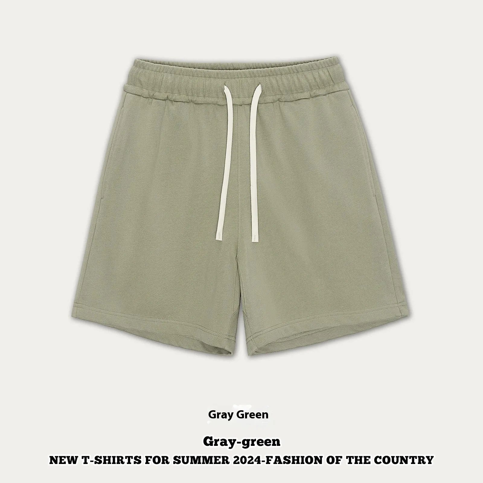 Child wearing loose-fit cotton denim shorts in charcoal grey, showing casual summer style.