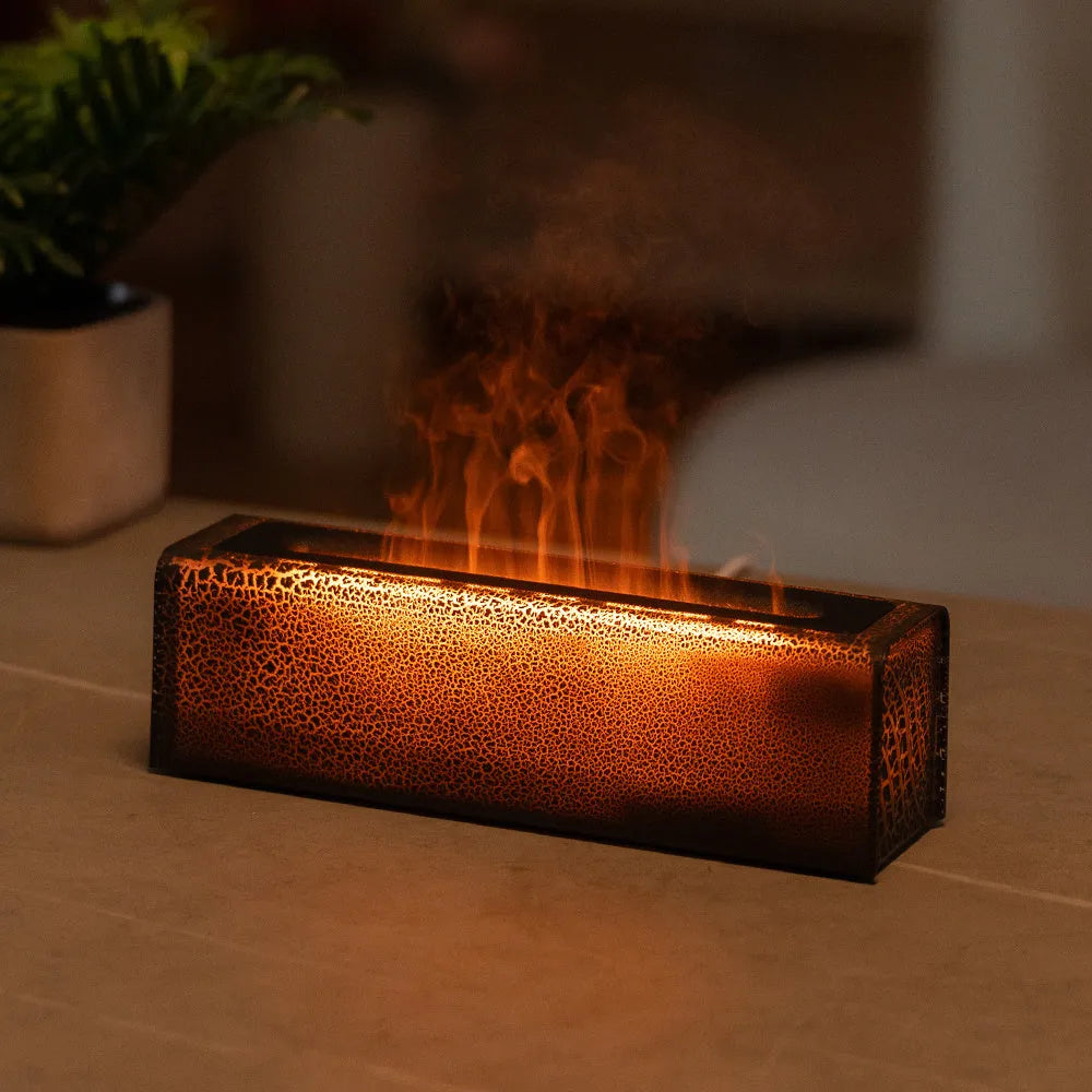 USB lava flame humidifier in black or white with colourful simulated flame and aromatherapy function on a desktop