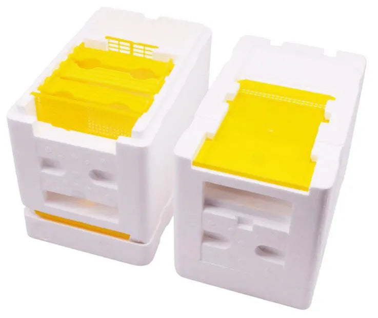 Three white EPS foam bee transport boxes for beehive supplies.