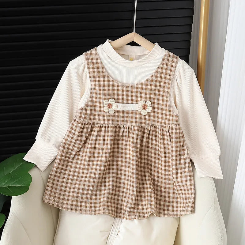 Baby girl wearing a dark coffee plaid Korean style long-sleeved dress suit with shirt.