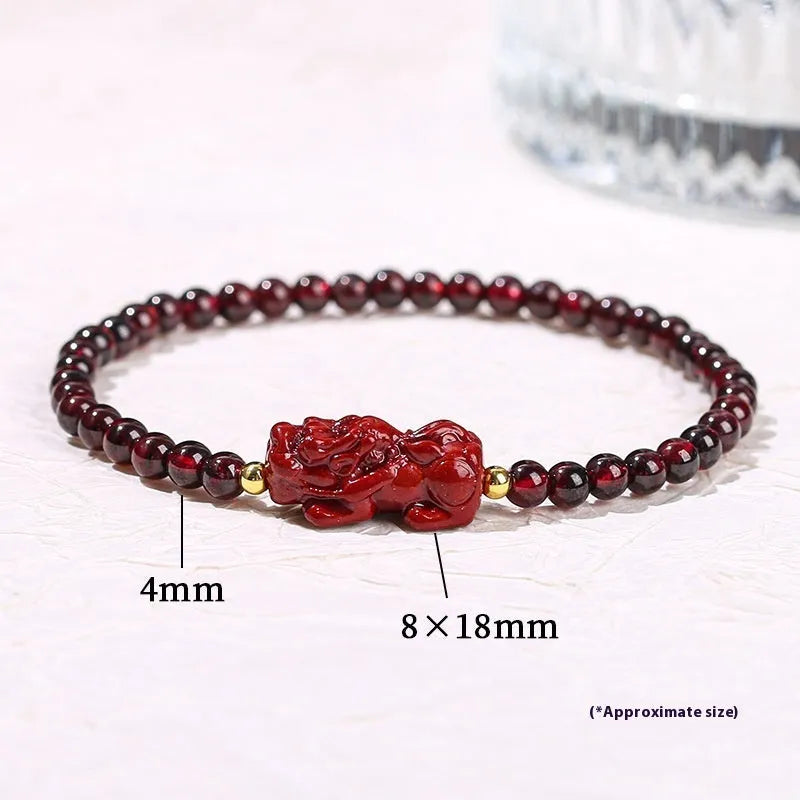 Natural garnet square bracelet with a carved purple sand and strawberry quartz Pixiu charm.
