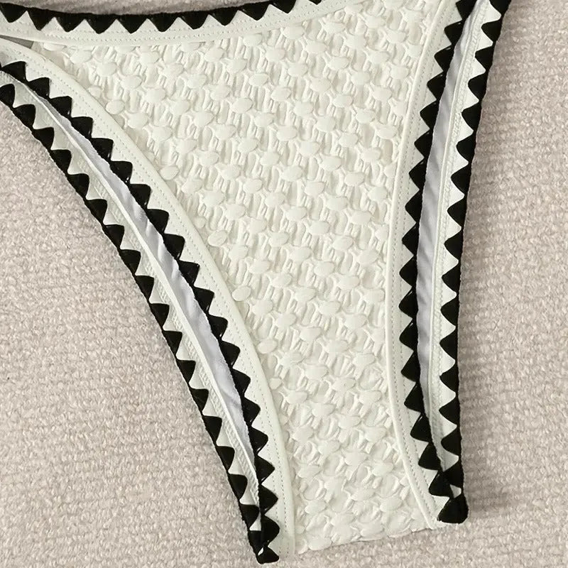 Women's white and blue split bikini swimsuit in polyester fabric with briefs style