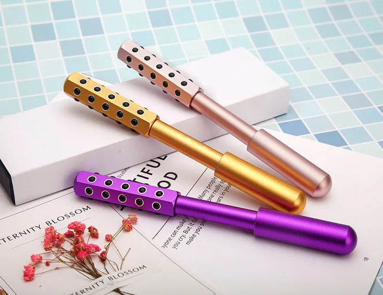 Germanium particle facial massage roller in purple colour, 193mm long handheld beauty instrument