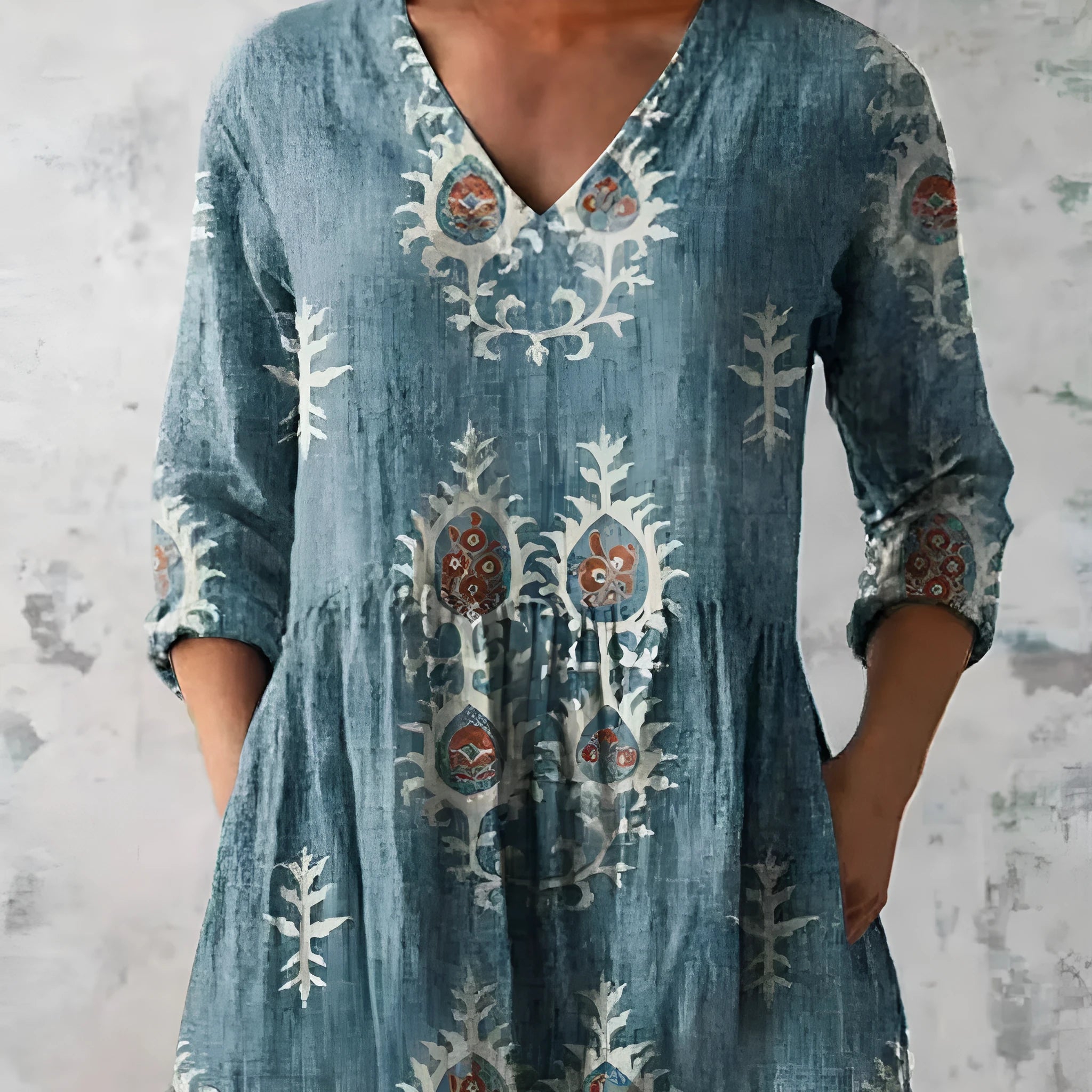 Women's printed loose dress with wide waist and 3/4 ruffle sleeves in a floral wave pattern.