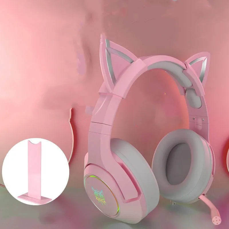 Pink cat ear wired headphones with microphone and LED lights on a stand