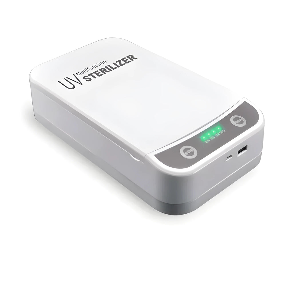 Compact white UV disinfection box with closed lid, showing scale next to a mobile phone.