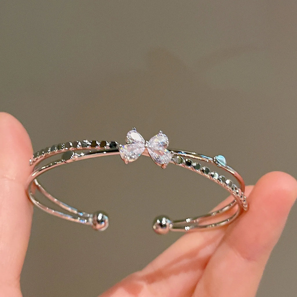 Women's silver electroplated copper bow bracelet with zircon stones minimal style