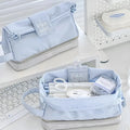 Double-layer folding pencil case in polyester fabric, shown in navy blue colour.