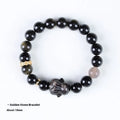 Handmade obsidian bracelet with lying rabbit charm, grey agate accents, and Yaoshi metallic elements in traditional national style