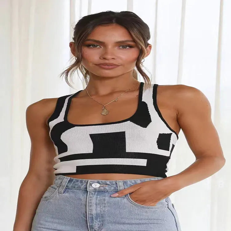 Women's slim fit U-neck camisole top in a street fashion style with an exposed navel design.