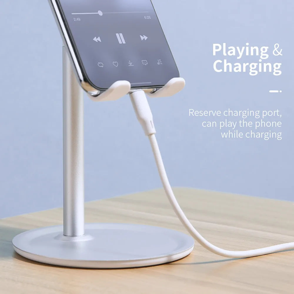 Aluminium alloy mobile phone and tablet stand in black or white on a desk