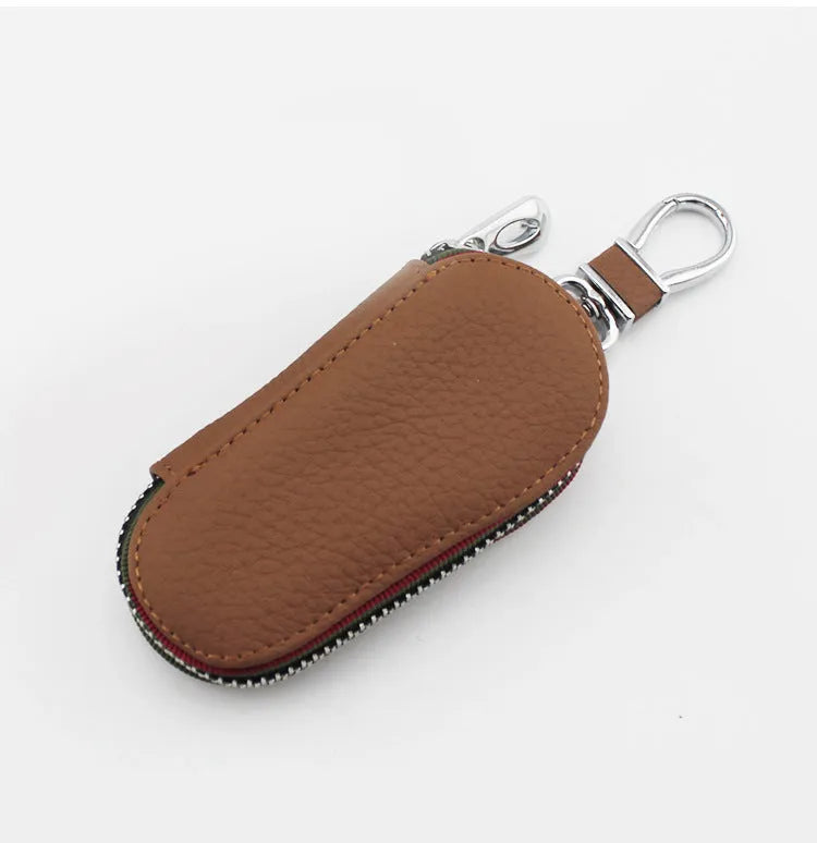 Brown leather universal car key case for storing a car key or remote fob