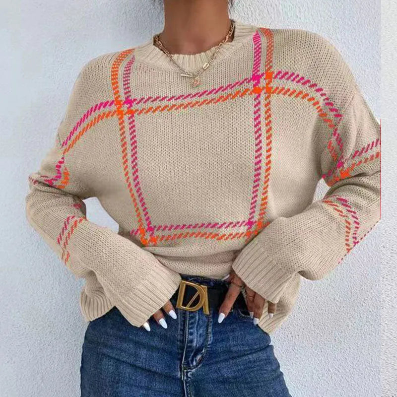 Women's loose fit plaid sweater with apricot, black, beige, red, and green colour-block stripes.