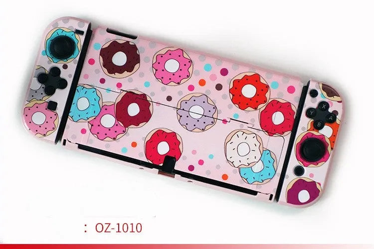 Nintendo Switch OLED hard protective case in decorative shell pattern with analogue caps