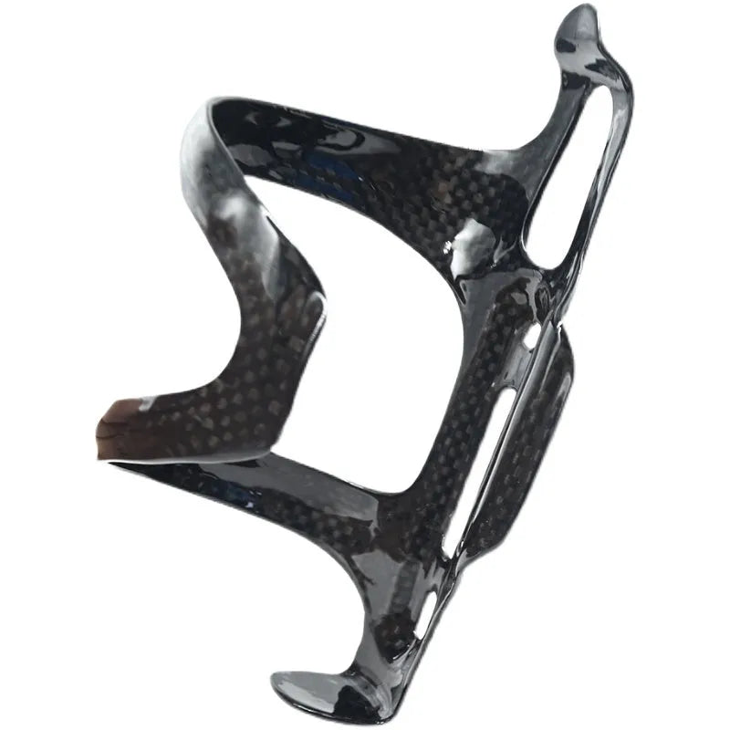 Black all-carbon fibre bicycle water bottle holder with side-pull quick release lever.