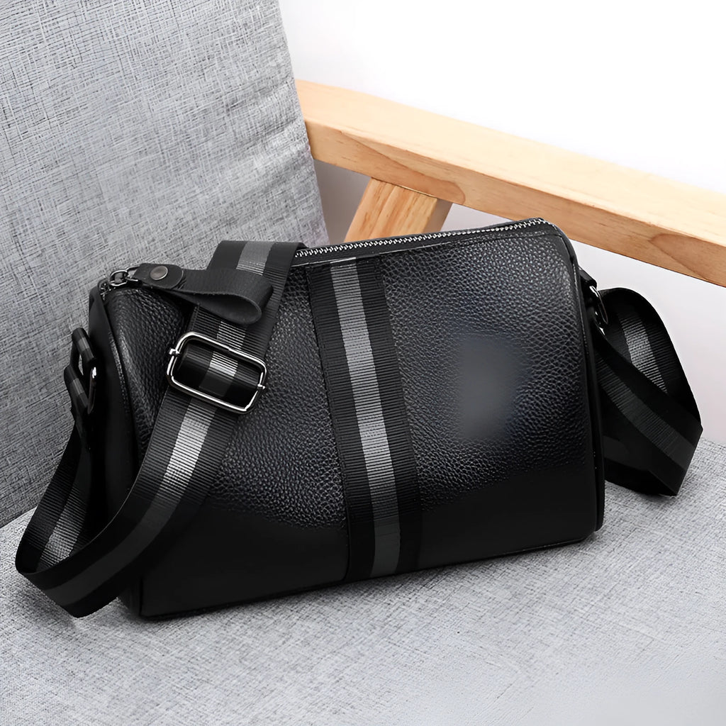 Black genuine leather one-shoulder crossbody bag with adjustable strap