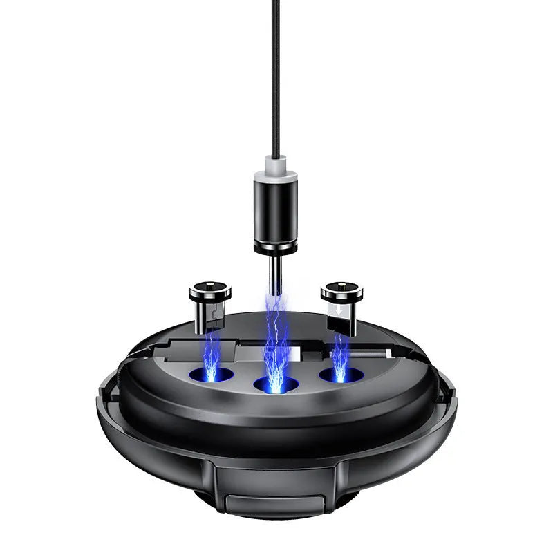 Magnetic Sucker 3-in-1 data cable in black with three connectors on a desk