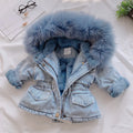 Blue denim jacket for girls with a fleece lining and attached hood.