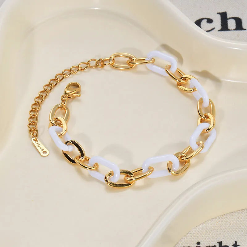 Women's stainless steel resin bracelet with a double-layer heart shape design.
