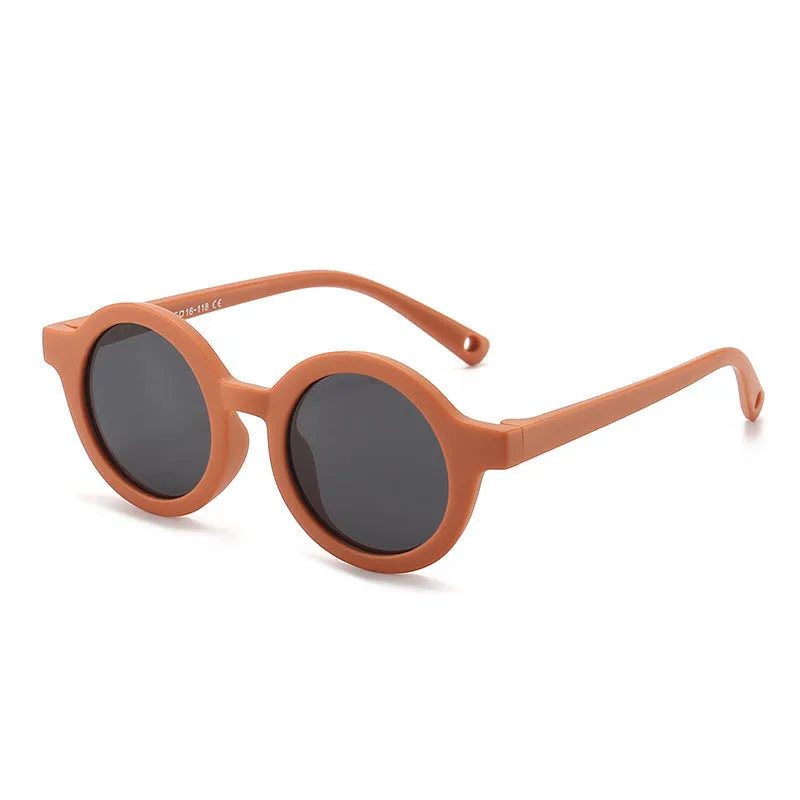 Children's silicone sunglasses for 0-3 year olds with round frame and polarized lenses in multiple colour options