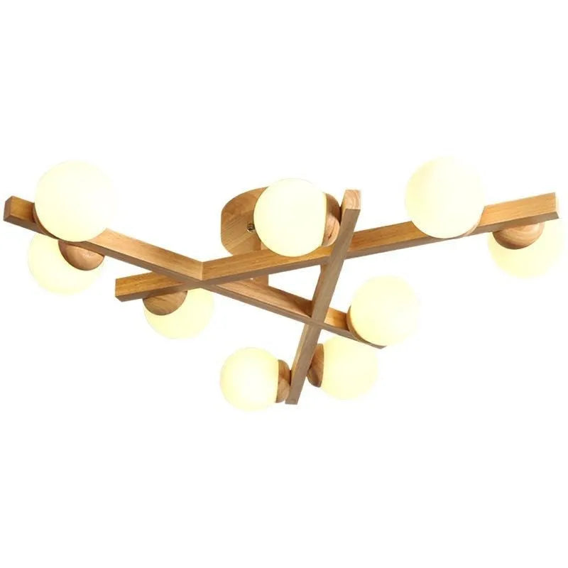 Modern Nordic-style wooden ceiling light fixture with three adjustable lamp heads mounted on a living room ceiling.