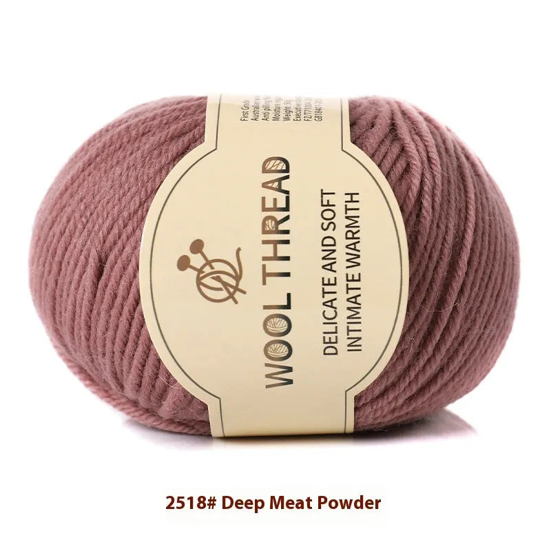 Roll of hand-knitting wool thread in various colours for scarf and sweater projects.
