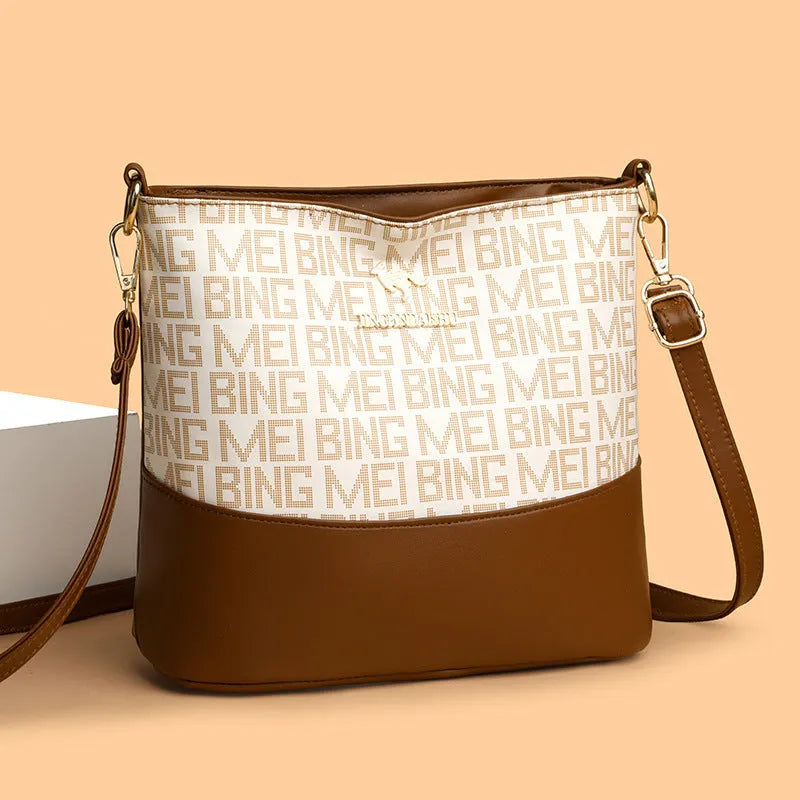 Brown retro messenger bag with soft leather texture showing interior phone and file compartments