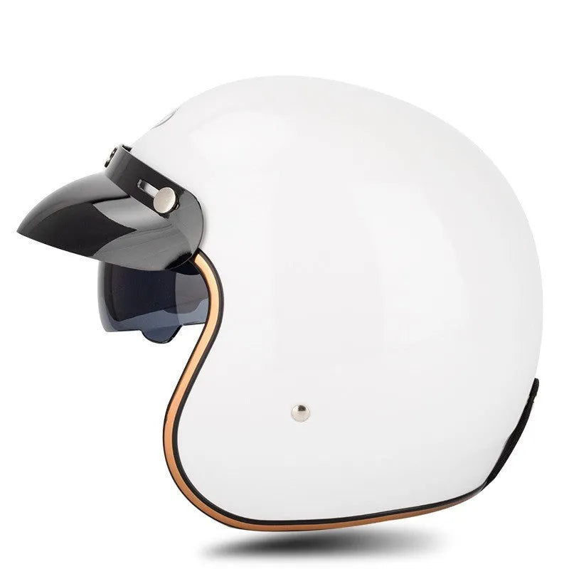 Retro-style half helmet for electric bicycles shown in a selection of colours including black, grey, white, and yellow.