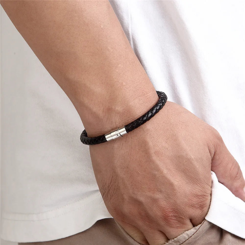 Geometric titanium steel bracelet with magnetic clasp shown on a wrist, demonstrating its unisex boyfriend style.