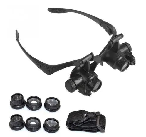 Black double eye magnifier glasses with LED lights and interchangeable lenses for precision repair work