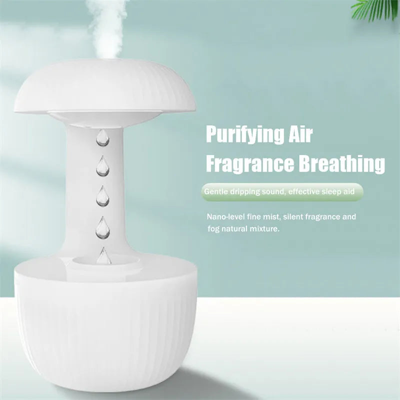 White anti-gravity USB humidifier showing water droplets appearing to flow upward with cool mist output