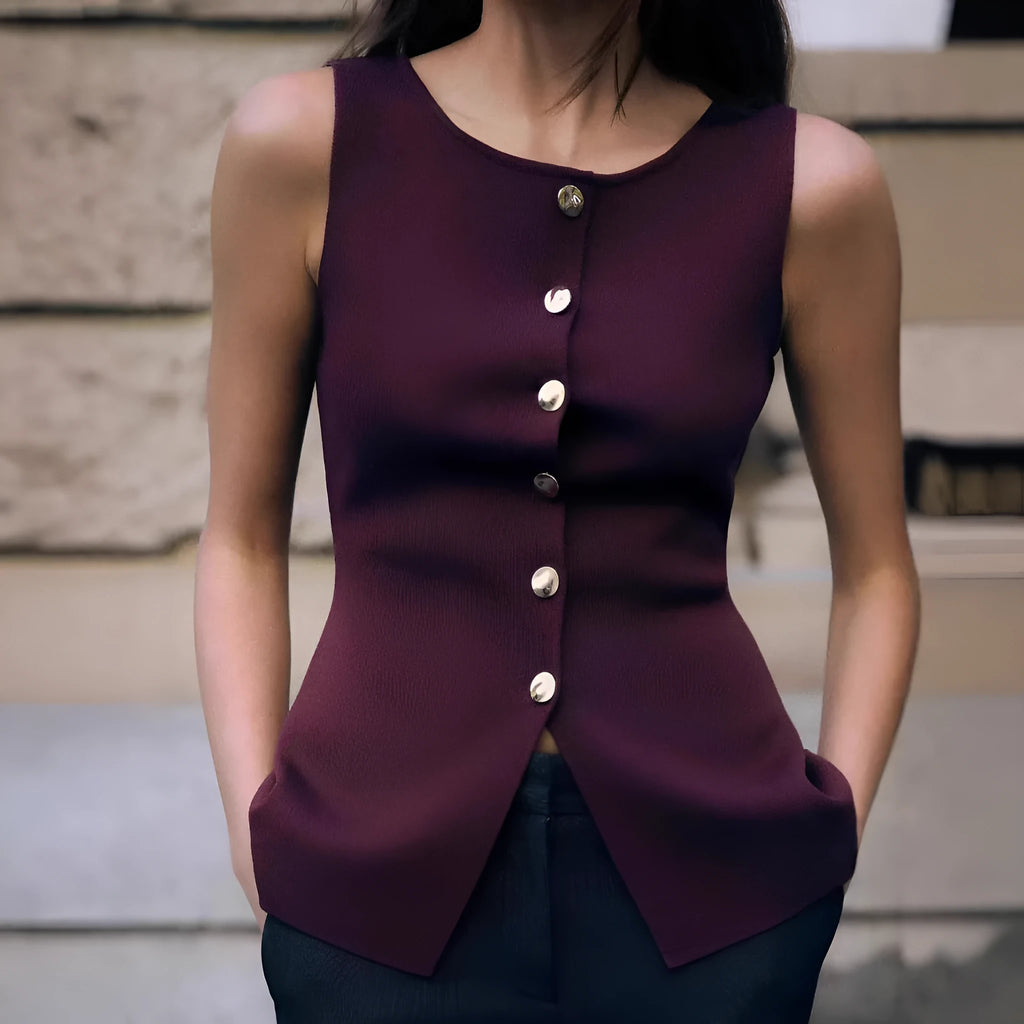 Dark red slim-fit sweater vest with gold buttons and 3D patterning on mannequin