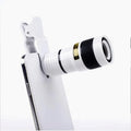 12X magnification phone telephoto lens with adjustable clip on a smartphone for long-distance photography.