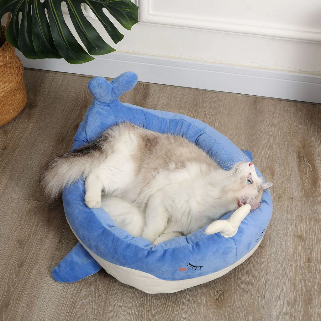 Blue duck-shaped fluffy pet bed for small dogs and cats on floor