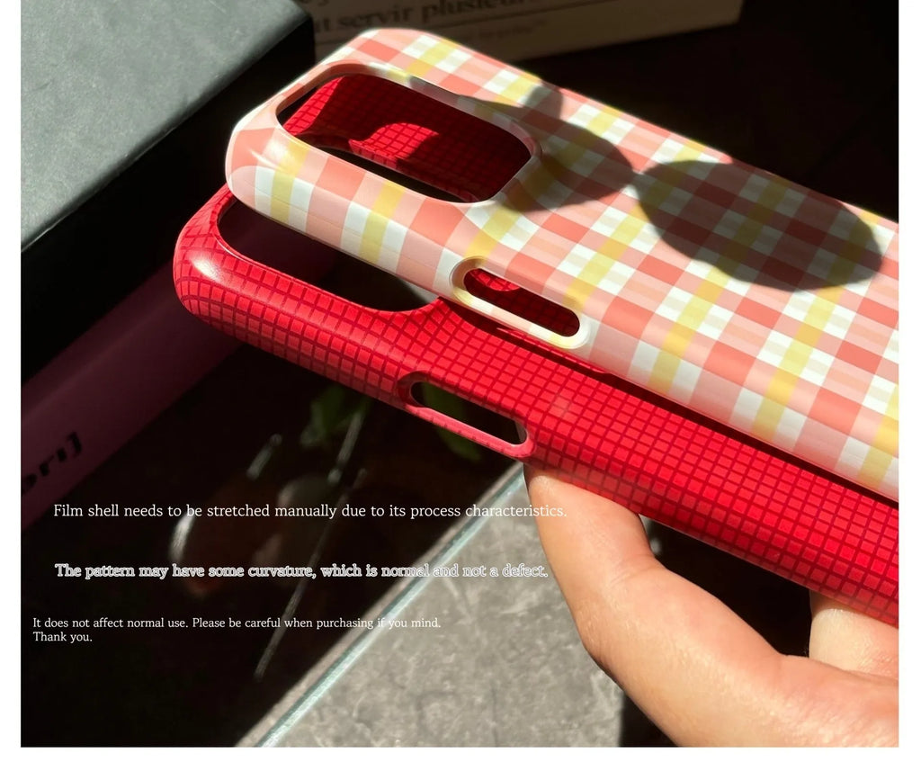 Original plain plaid design iPhone 15 Pro Max case in glossy red grid or frosted orange grid options.