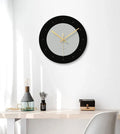 29.5cm clear tempered glass minimalist wall clock with transparent numbers on white wall.