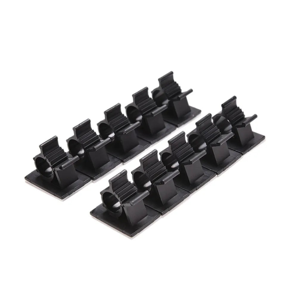 Black nylon adhesive cable clamps showing two-stage lock design for 13mm maximum cable diameter