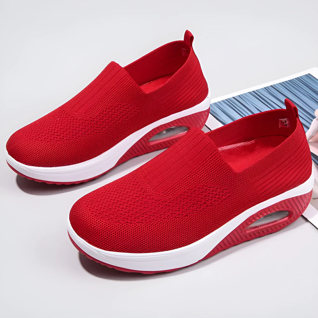 Women's black mesh running shoes with round toe and mid heel on a white background
