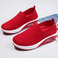 Women's black mesh running shoes with round toe and mid heel on a white background