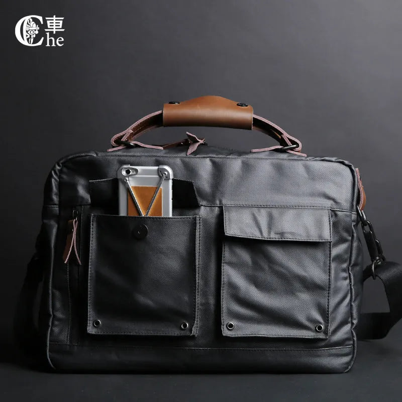 Dpark black 14 inch laptop bag with single shoulder strap showing padded compartment and organisation pockets
