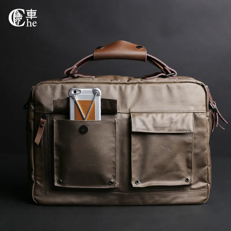 Dpark black 14 inch laptop bag with single shoulder strap showing padded compartment and organisation pockets