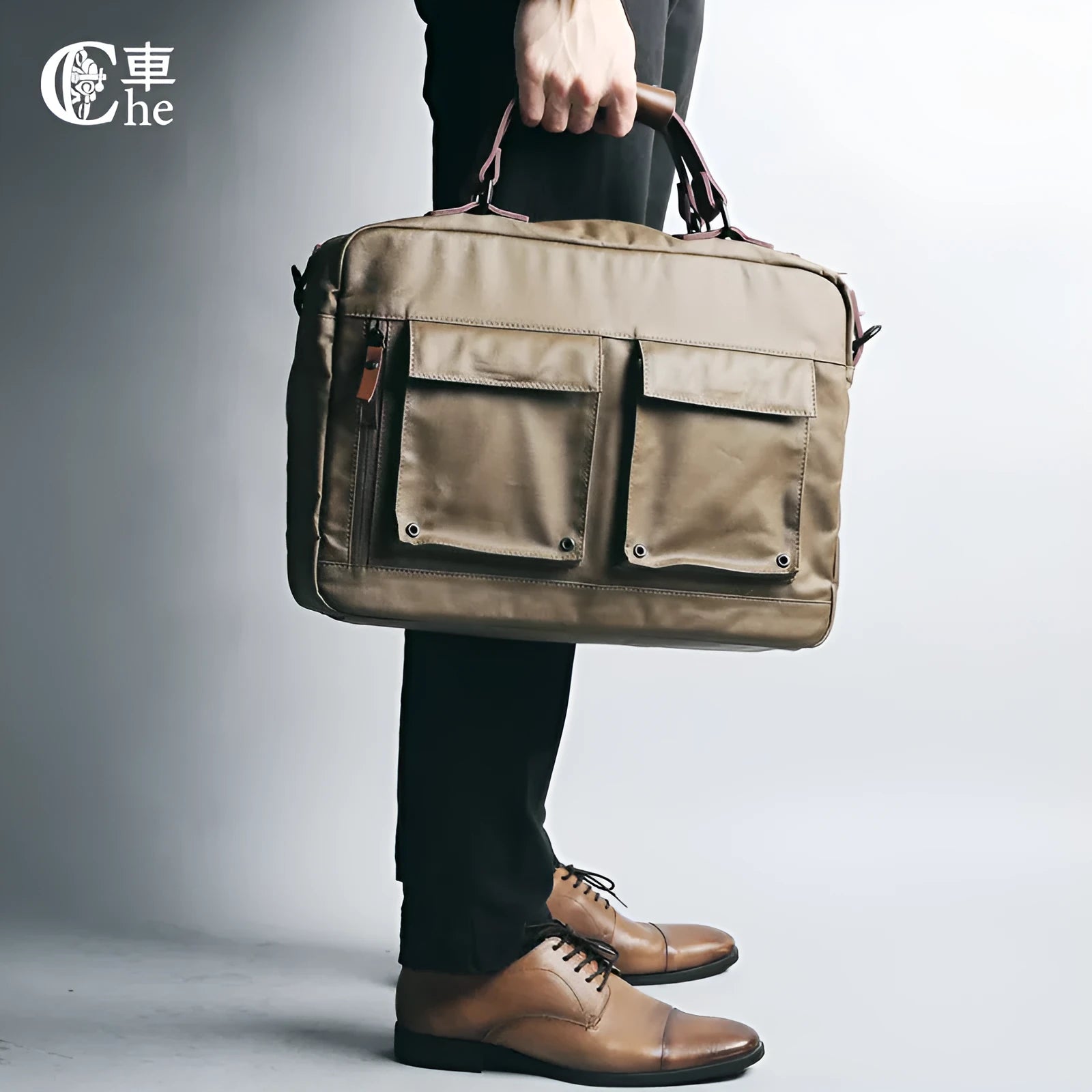 Dpark black 14 inch laptop bag with single shoulder strap showing padded compartment and organisation pockets