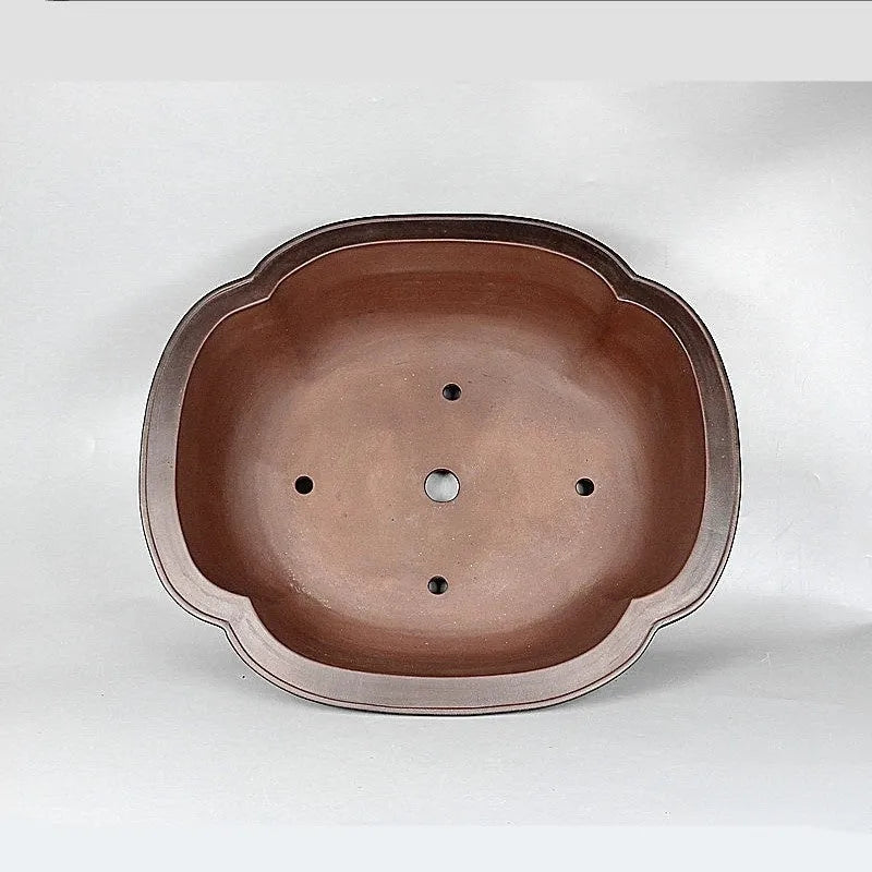 Handmade Chinese style crabapple-shaped purple clay flowerpot for plants.