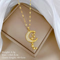 Geometric moon pendant necklace with tassel on a stainless steel chain, showing copper metal tone.