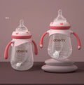 Wide neck anti-colic baby bottle with detachable handles in blue, green, and red colours