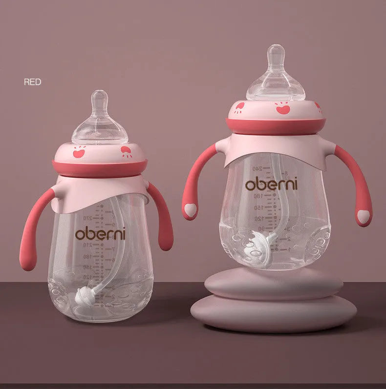 Wide neck anti-colic baby bottle with detachable handles in blue, green, and red colours