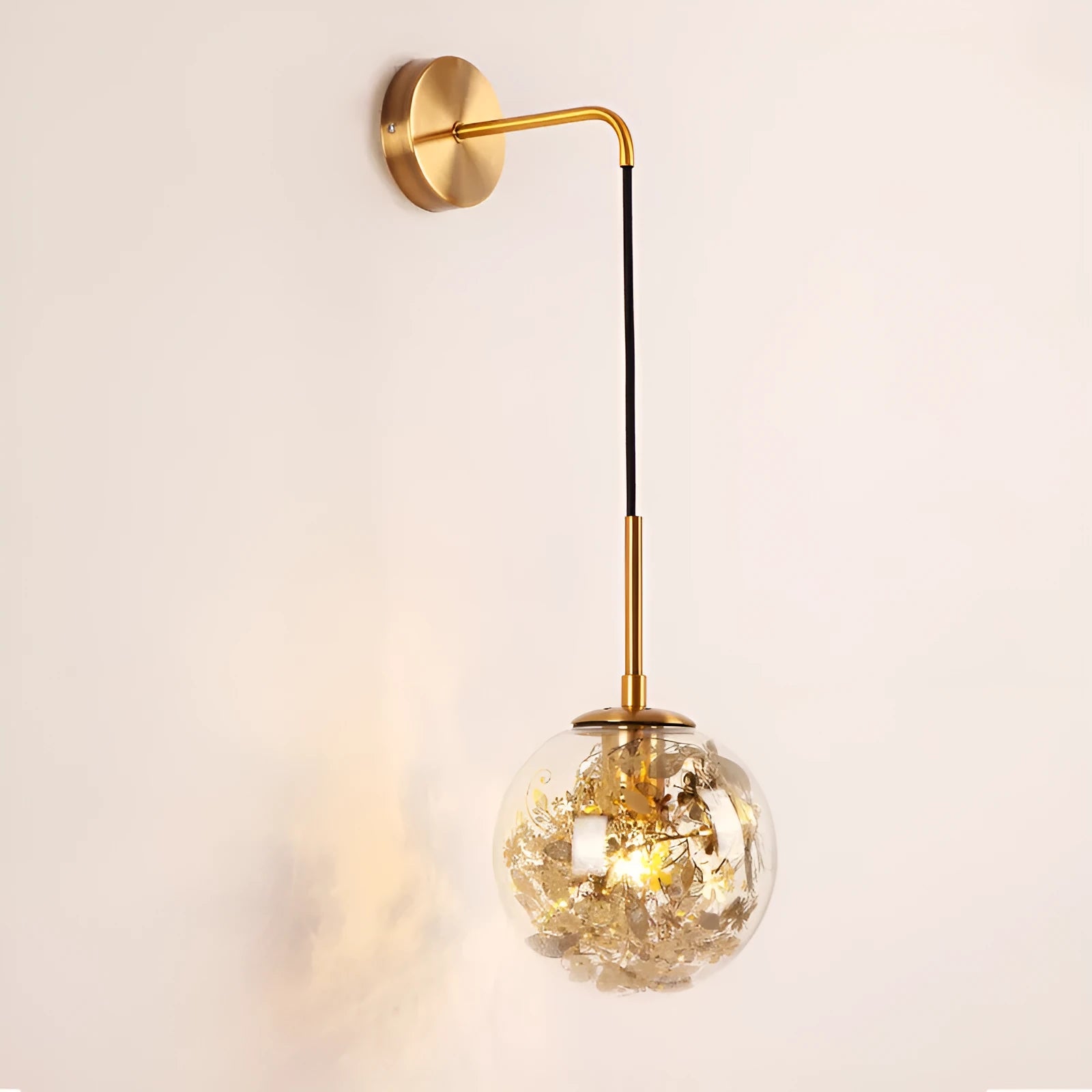 Modern glass wall lamp with LED light in gold or silver finish, shown in 15cm and 20cm sizes.